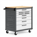 Carrello portautensili 77 x 46 x 90 cm in acciaio nero e bianco con piano in legno e 7 cassetti